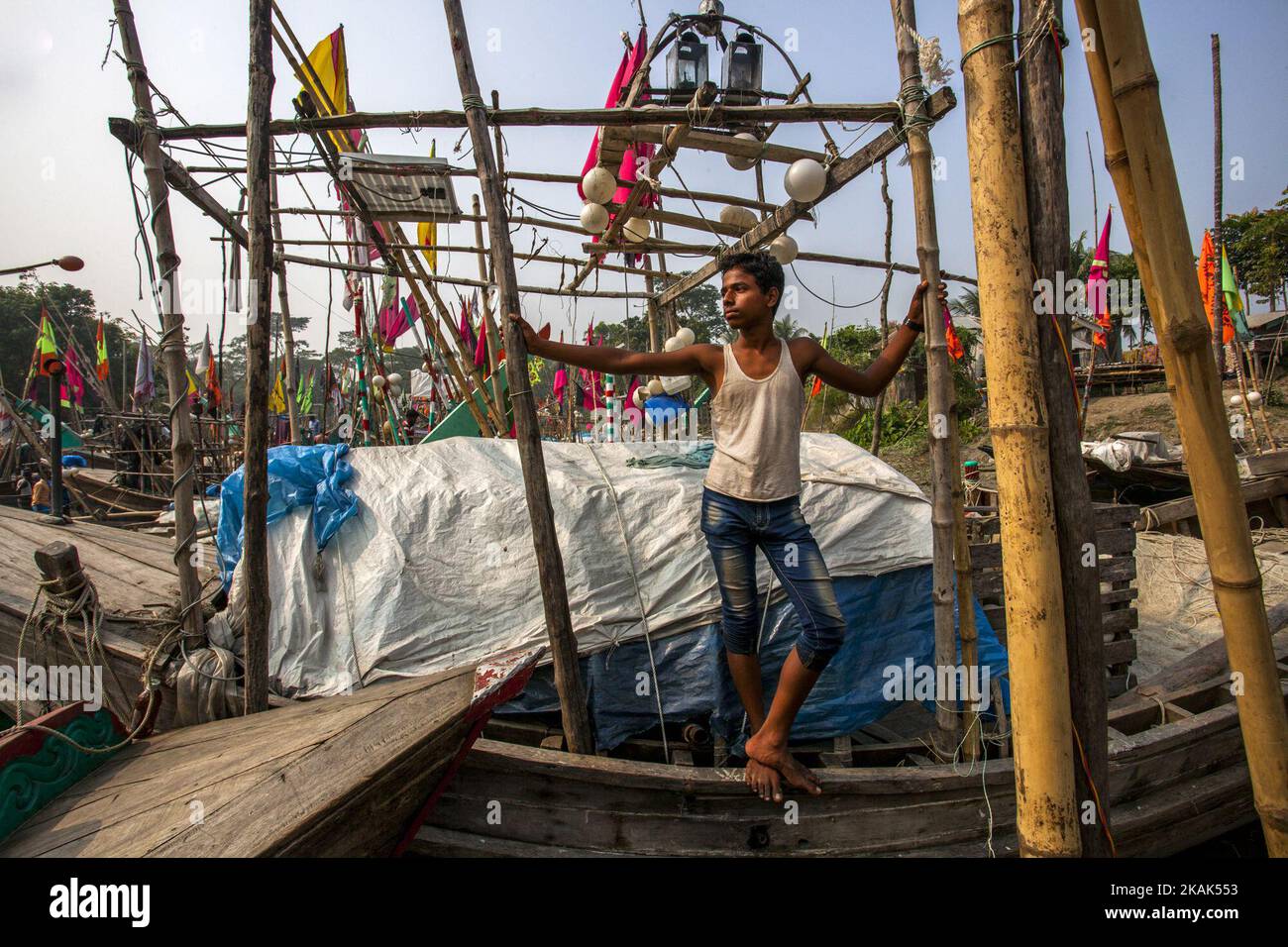 Brave fishermen of Bhola, Bangladesh on 31 December 2016. Bhola is a southern coastal district of Bangladesh, agriculture and fishing are two major profession for the people of Bhola. Fishermen are preparing their net and boat to go to the mighty river Meghna one of the most fierce river of Bangladesh.(Photo by Khandaker Azizur Rahman Sumon/NurPhoto) *** Please Use Credit from Credit Field *** Stock Photo