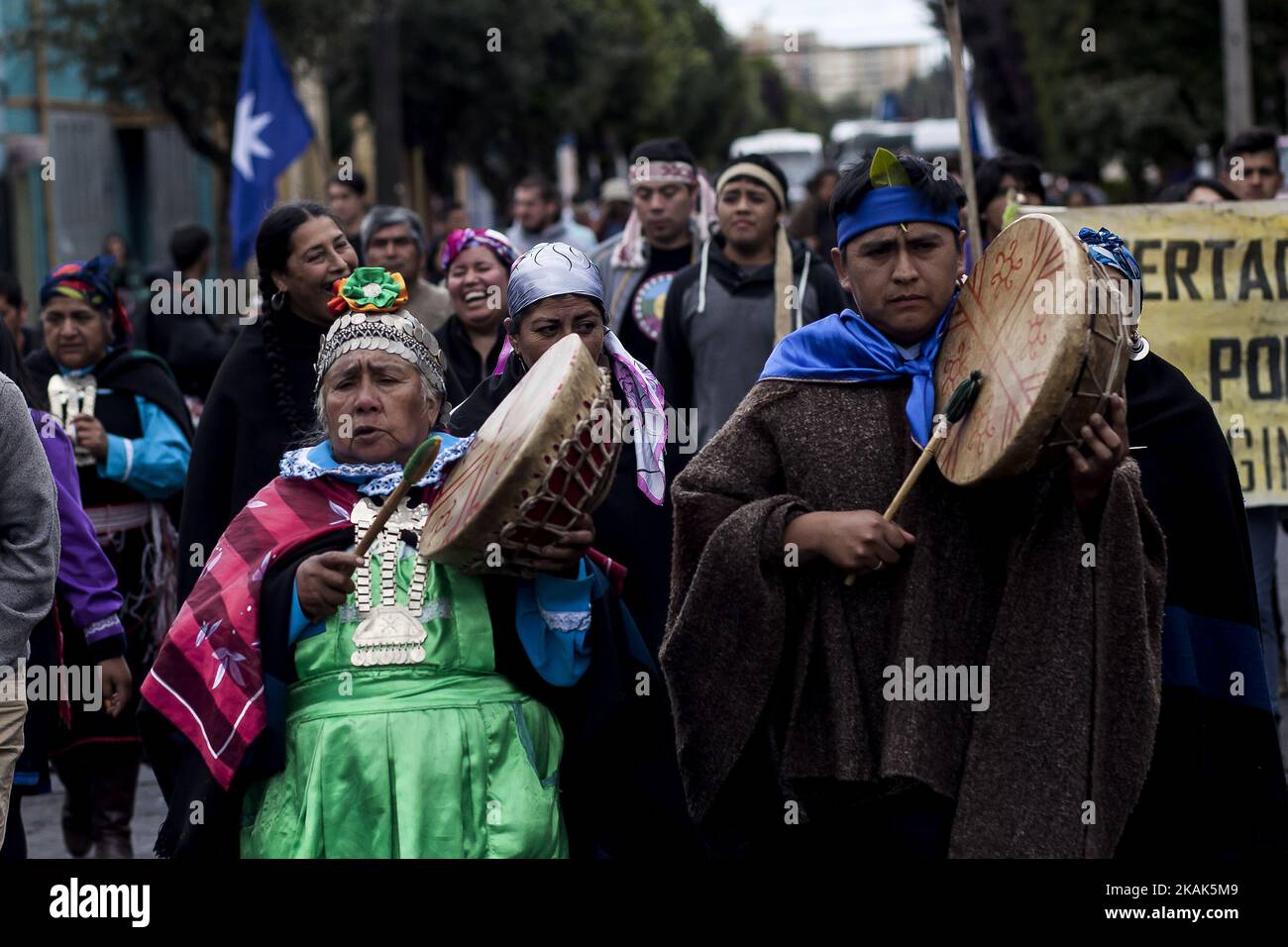 Members of mapuche communities during the demonstration in Temuco, Chile on 4 January 2016. With traditional prayers and a march to mark the 9 years of the death of the Young mapuche Matias Catrileo murdered by de chilean pÃ³lice in Temuco, Chile. (Photo by Fernando Lavoz/NurPhoto) *** Please Use Credit from Credit Field *** Stock Photo