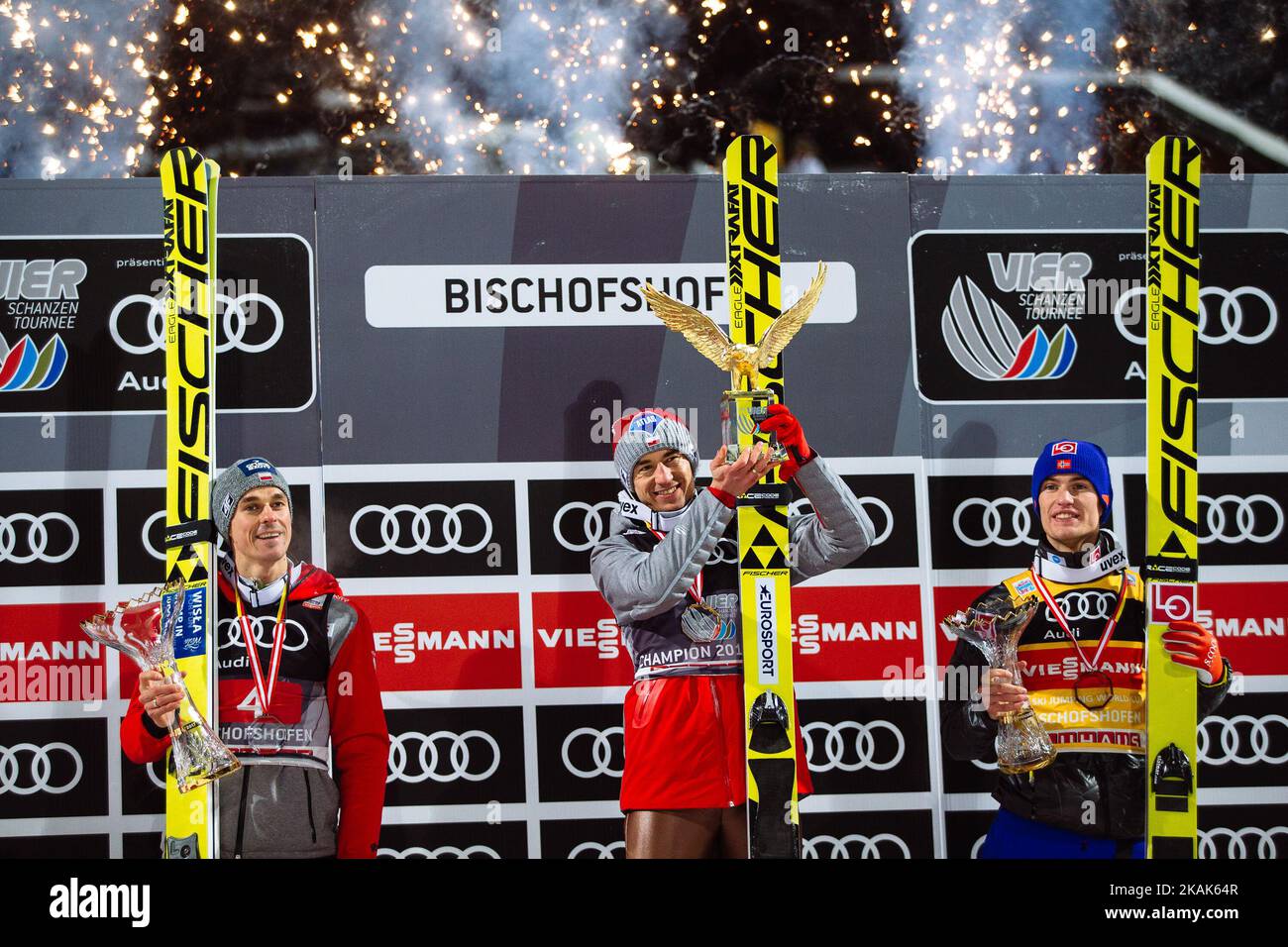 Kamil Stoch (C) of Poland celebrates winning the 65th Four Hills Tournament ski jumping event with Daniel Andre Tande (2nd Place, R) of Norway and Piotr Zyla (3rd Place, L) of Poland on Day 2 of the 65th Four Hills Tournament ski jumping event at Paul-Ausserleitner-Schanze on January 6, 2017 in Bischofshofen, Austria. (Photo by Damjan Zibert/NurPhoto) *** Please Use Credit from Credit Field *** Stock Photo