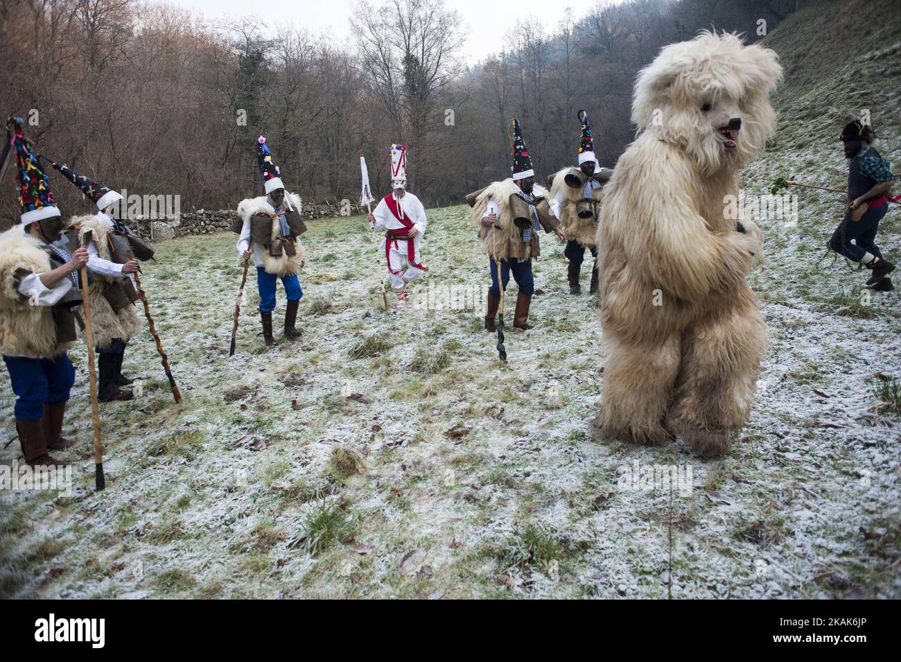 The zarramacos persecute the bear by the mountains of Silio (Cantabria) in the party of the Vijanera festival on January 8, 2017 in Silio, Cantabria province, Spain, considered the first carnival of winter in Europe. (Photo by Joaquin Gomez Sastre/NurPhoto) *** Please Use Credit from Credit Field *** Stock Photo
