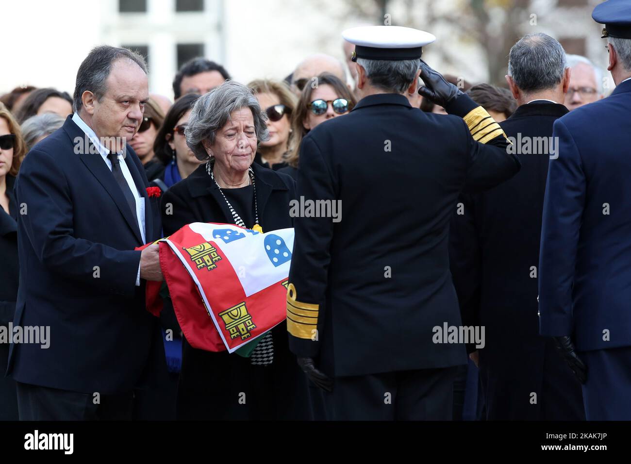 Portugal's President Marcelo Rebelo de Sousa (unseen) delivers the Portugal's coffin flag to the son Joo Soares (L ) and daughter Isabel Soares (C ) during the Funeral Ceremony of the late former Portuguese President Mario Soares at the Prazeres cemetery in Lisbon, on January 10, 2017. The founder of Portugal's Socialist Party, who served as president from 1986-96, died in hospital on January 7, 2017. ( Photo by Pedro Fiuza/NurPhoto) *** Please Use Credit from Credit Field *** Stock Photo