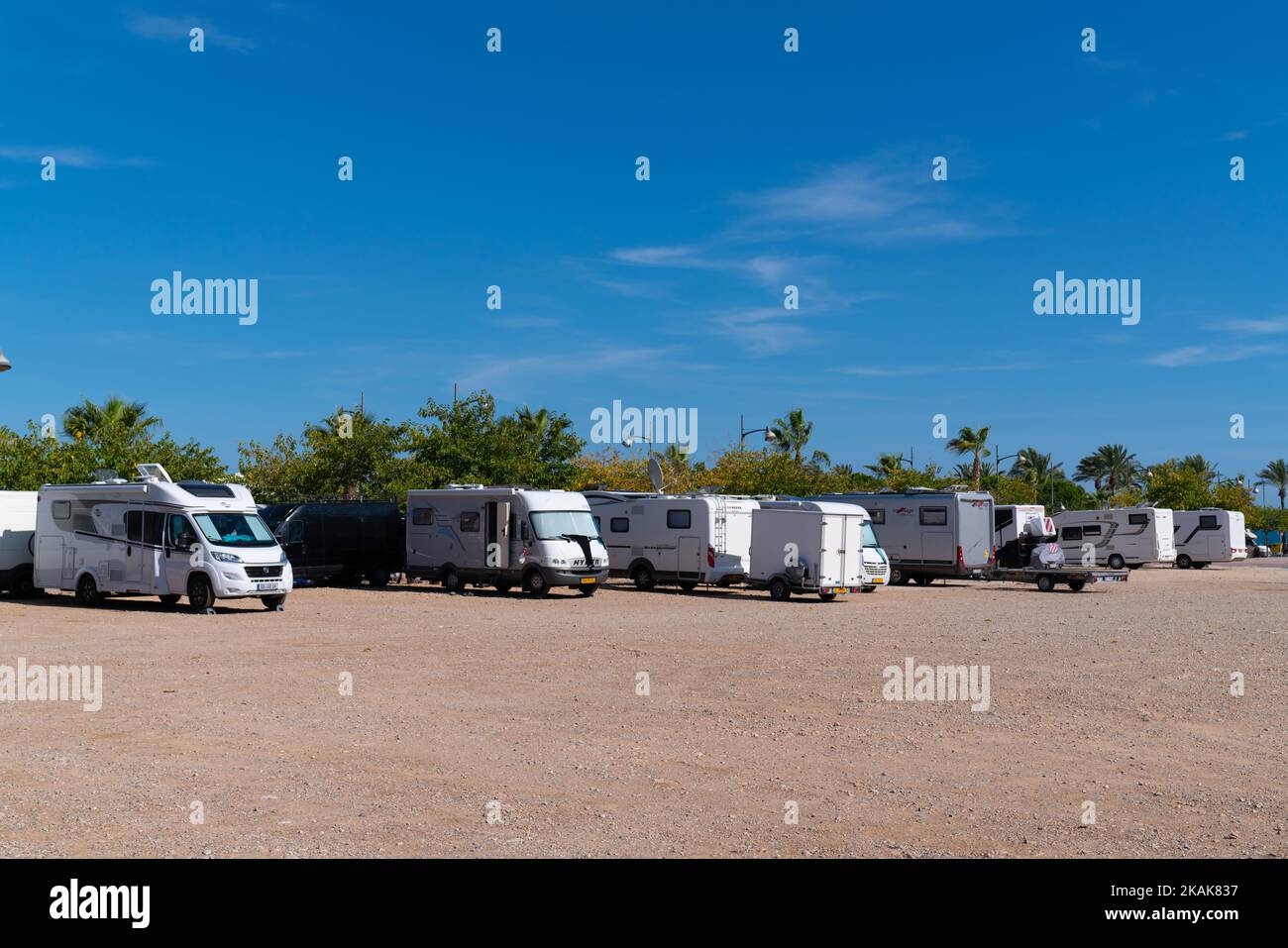 Motorhomes and campervans parked at the spanish aire in Vinaros, Costa