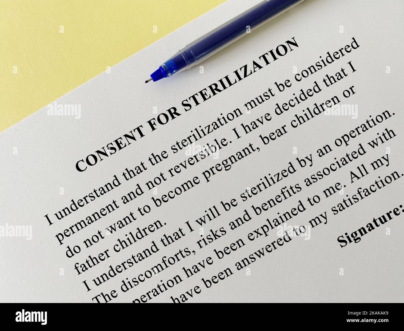 One person is reading consent for sterilization Stock Photo Alamy