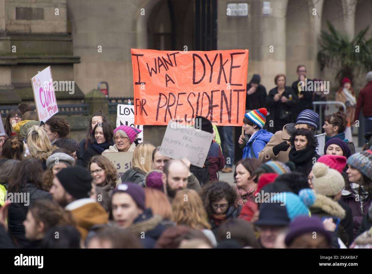 People participate in a 'Stop Trump' demonstration on Saturday Jan. 21, 2017 in Manchester, United Kingdom. The demonstration, which happened in solidarity with other demonstrations in other cities, called for change of POTUS from President Trump the day after President Trump's inauguration. (Photo by Jonathan Nicholson/NurPhoto) *** Please Use Credit from Credit Field *** Stock Photo