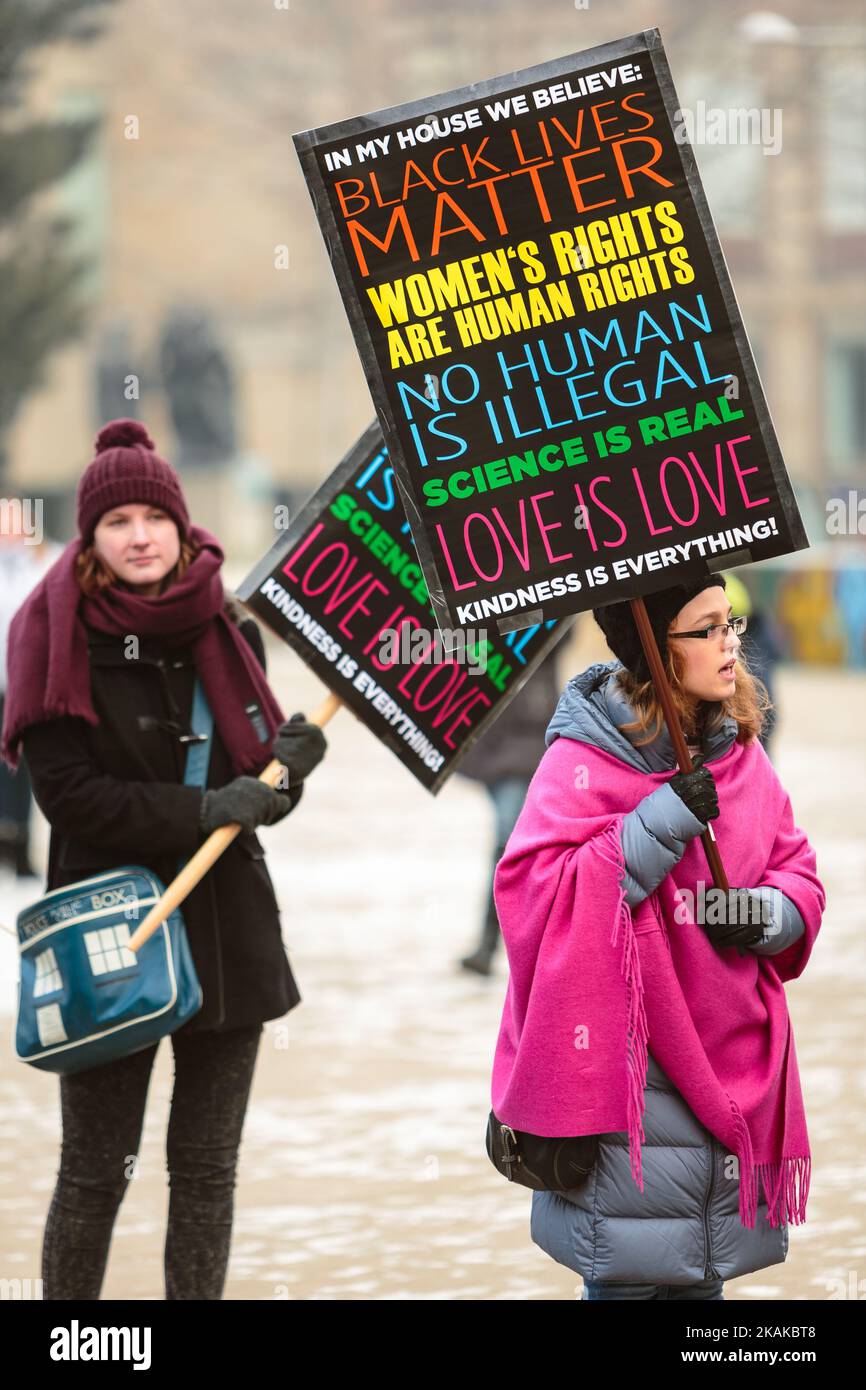 Women attend a protest for women's rights and freedom in solidarity ...