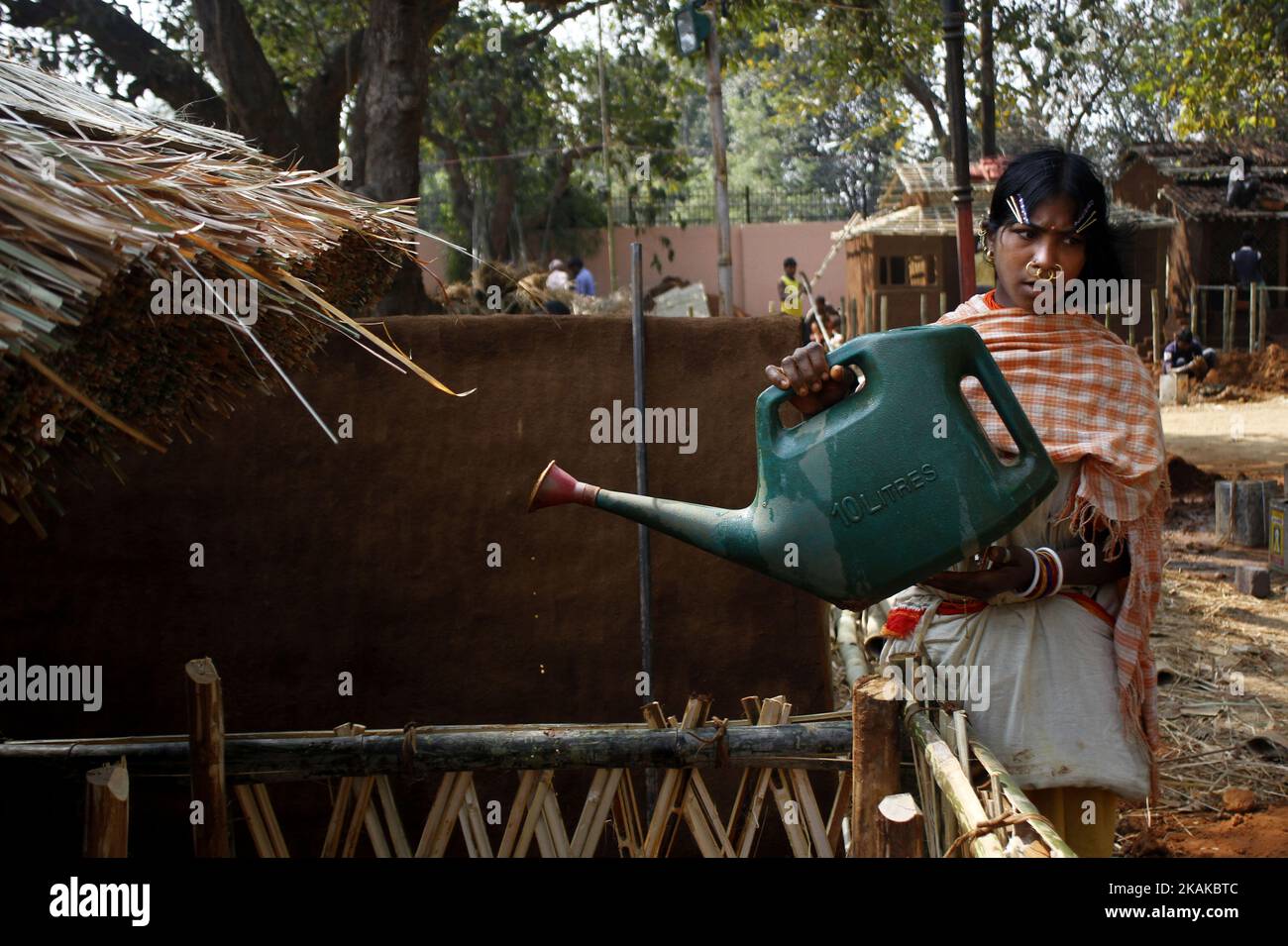 Indigenous Dongria caste tribes look near to their temporary traditional huts as they are preparing it ahead of an annual Tribal Fair, scheduled to starts on the Republic Day of India in the eastern Indian city Bhubaneswar, India, Saturday, 21 January 2017. These Dongria caste tribes live inside the Niyamgiri hills of Kalahandi district of Odisha state in India. (Photo by NurPhoto) *** Please Use Credit from Credit Field *** Stock Photo