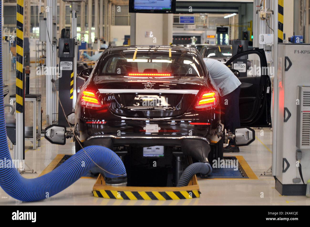 Workers assembling car type sedan E-Class at Mercedes-Benz plant in Wanaherang district, Bogor, West Java, on January 24, 2017. Mercedes-Benz Indonesia started the inaugural assembly in Indonesia for the series E-Class with two variants of the E 250 and E 300 Avantgarde AMG with high technology to increase sales in Asia, especially in Indonesia. Dasril Roszandi (Photo by Dasril Roszandi/NurPhoto) *** Please Use Credit from Credit Field *** Stock Photo