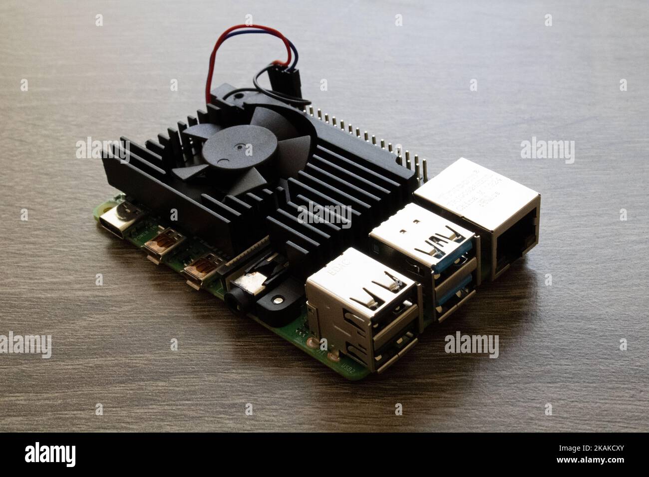 A Raspberry Pi Microcomputer 4B with a black heatsink for Electrical Engineering prototyping and software development for K-12 STEM Stock Photo