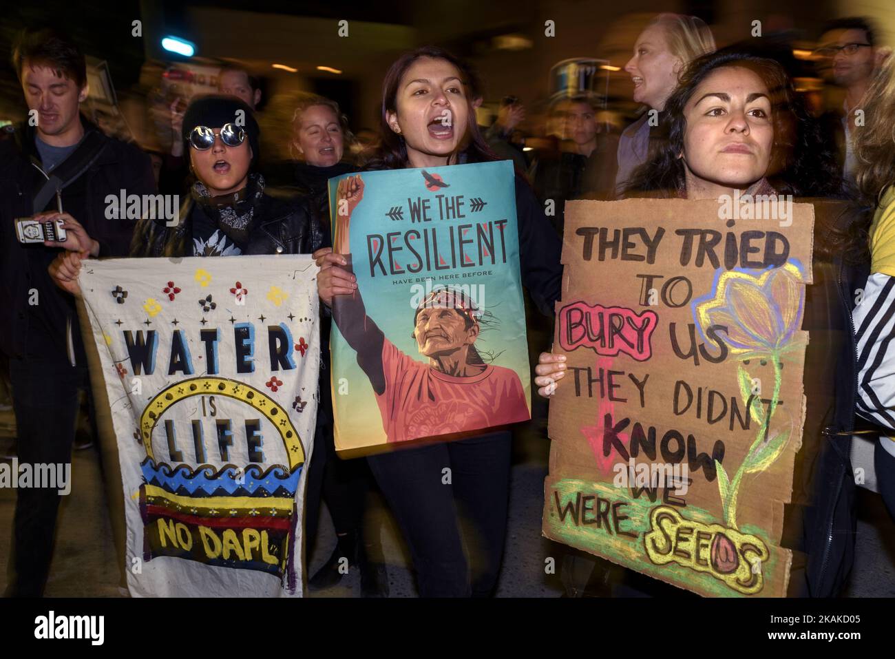 Activists in Los Angeles protest President Donald TrumpÂ’s executive actions to advance the approval of the Dakota Access and Keystone XL oil pipelines. Los Angeles, California. January 24, 2017. (Photo by Ronen Tivony/NurPhoto) *** Please Use Credit from Credit Field *** Stock Photo