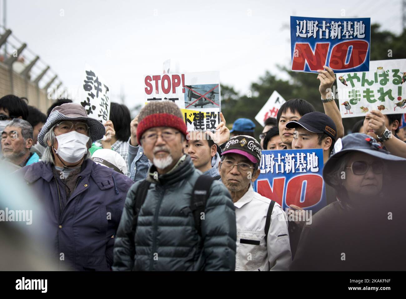 Anti U.S. Base protesters with placards stage a rally outside of the U.S Marine Camp Schwab to protest against the construction of the new U.S Marine Airbase in Nago, Okinawa, Japan on Wednesday, February 1, 2017. Okinawa Gov. Takeshi Onaga arrived in the United States on Tuesday, aiming to convey to President Donald TrumpÂ’s administration local opposition to a plan to relocate a U.S. airbase within the southern island prefecture. (Photo by Richard Atrero de Guzman/NurPhoto) *** Please Use Credit from Credit Field *** Stock Photo