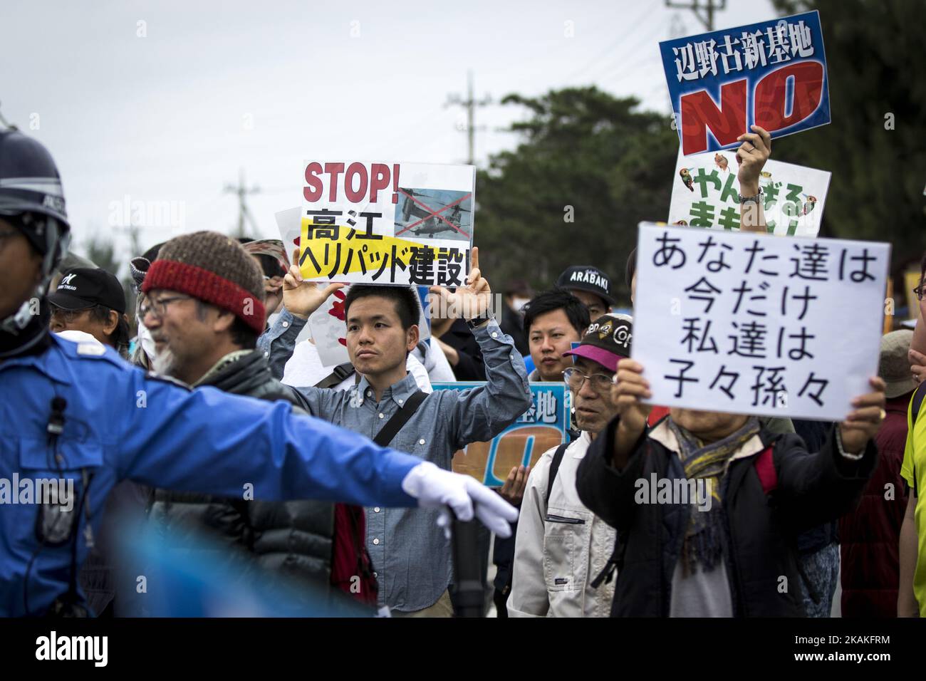 Anti U.S. Base protesters with placards stage a rally outside of the U.S Marine Camp Schwab to protest against the construction of the new U.S Marine Airbase in Nago, Okinawa, Japan on Wednesday, February 1, 2017. Okinawa Gov. Takeshi Onaga arrived in the United States on Tuesday, aiming to convey to President Donald TrumpÂ’s administration local opposition to a plan to relocate a U.S. airbase within the southern island prefecture. (Photo by Richard Atrero de Guzman/NurPhoto) *** Please Use Credit from Credit Field *** Stock Photo