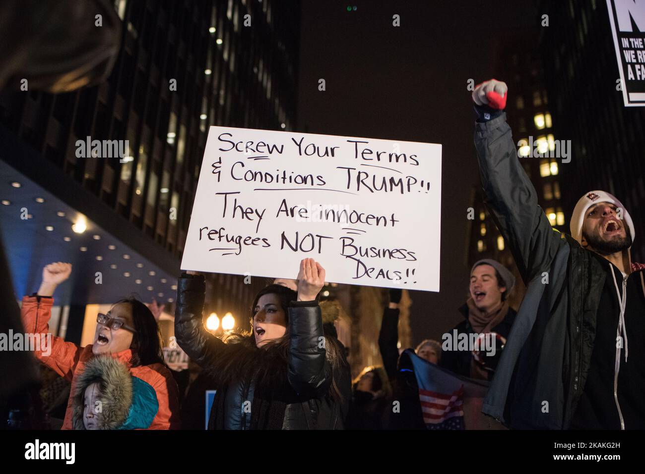 Hundreds of demonstrators in Chicago march in protest of President Trump's executive order that temporarily blocks refugees and travelers from seven predominantly Muslim countries from entering the United States on February 1, 2017. (Photo by Max Herman/NurPhoto) *** Please Use Credit from Credit Field *** Stock Photo
