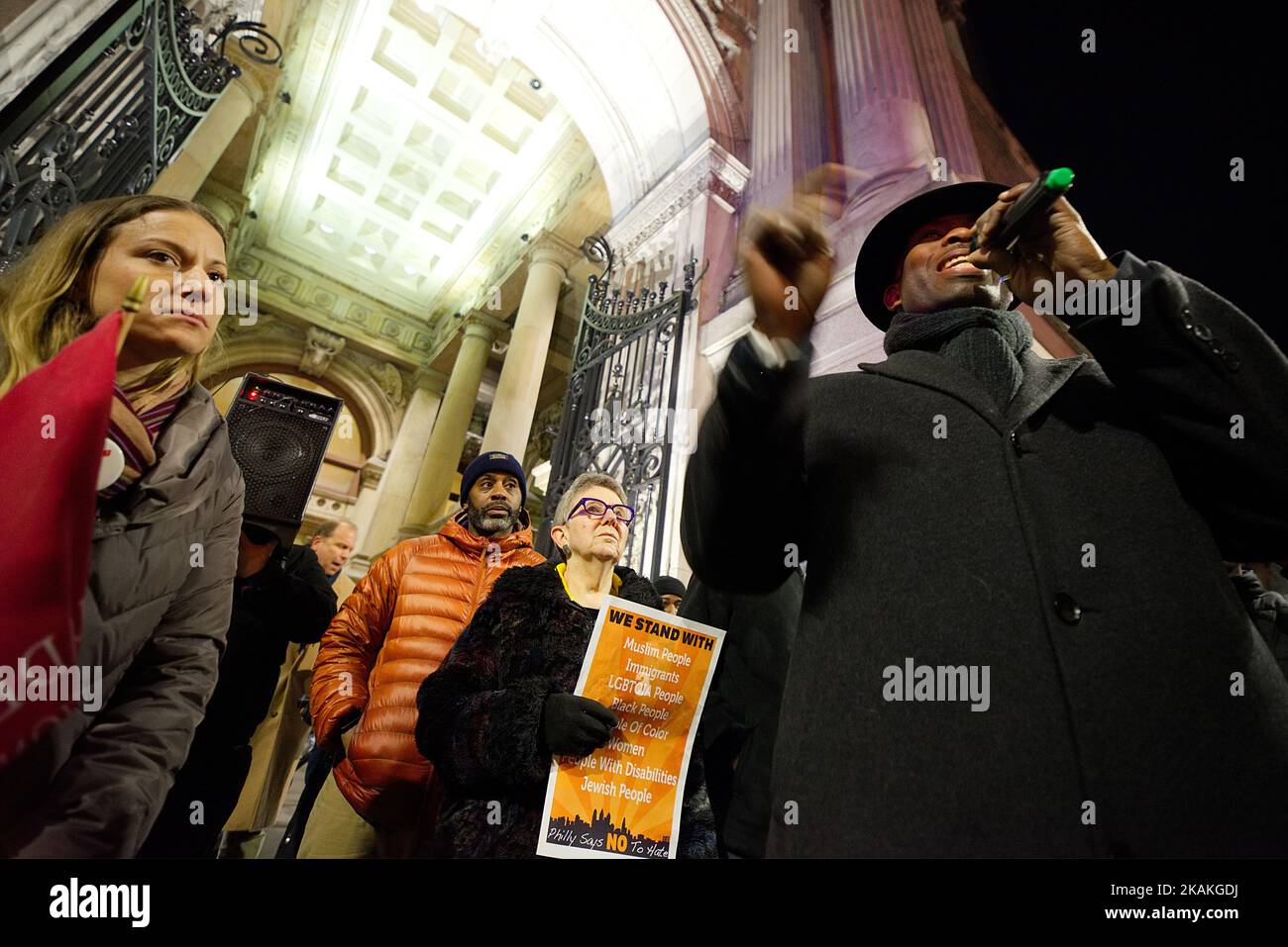 Hillary Linardopoulos, staffer with Philadelphia Federation of Teachers (PFT), is seen listening as Councilman Derek Green speaks to a small crowd gathered outside Philadelphia City Hall, during a February 2nd 2017 Anti-Discrimination Protest. (Photo by Bastiaan Slabbers/NurPhoto) *** Please Use Credit from Credit Field *** Stock Photo