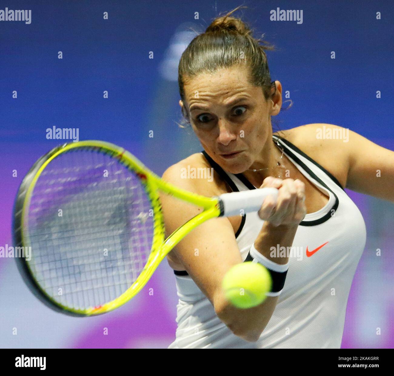 Roberta Vinci of Italy returns the ball to Kristina Mladenovic of France during their quarterfinal match at St. Petersburg Ladies Trophy tennis tournament on February 3, 2017 in St. Petersburg, Russia. (Photo by Mike Kireev/NurPhoto) *** Please Use Credit from Credit Field *** Stock Photo