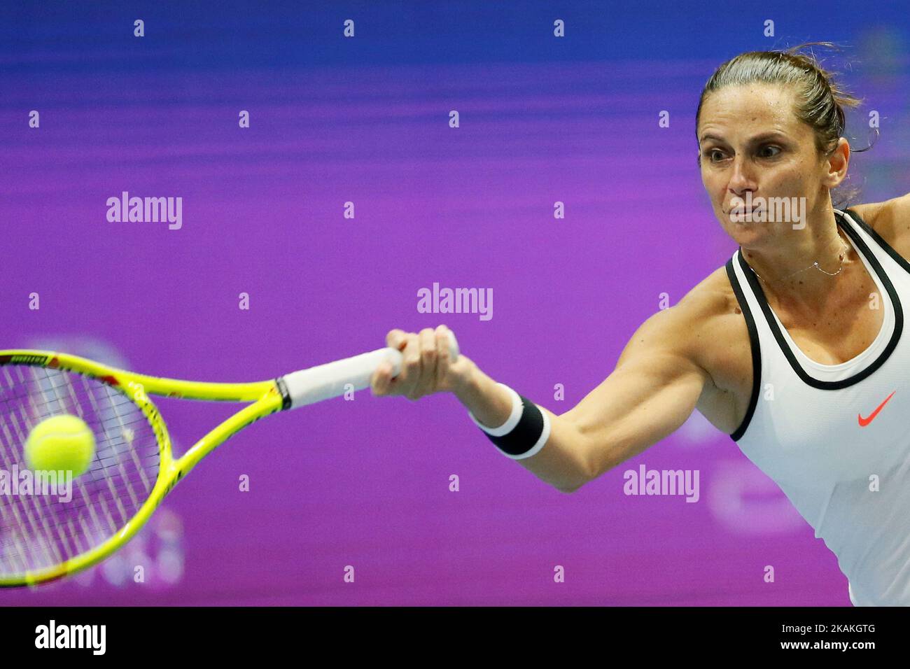 Roberta Vinci of Italy returns the ball to Kristina Mladenovic of France during their quarterfinal match at St. Petersburg Ladies Trophy tennis tournament on February 3, 2017 in St. Petersburg, Russia. (Photo by Mike Kireev/NurPhoto) *** Please Use Credit from Credit Field *** Stock Photo