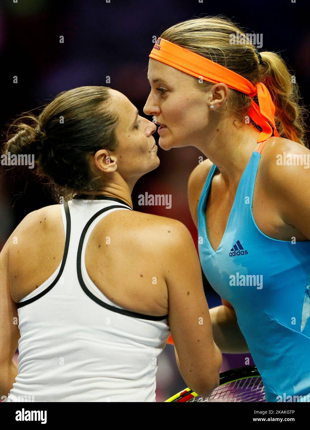 Kristina Mladenovic (R) of France and Roberta Vinci of Italy greet each other after their quarterfinal match at St. Petersburg Ladies Trophy tennis tournament on February 3, 2017 in St. Petersburg, Russia. (Photo by Mike Kireev/NurPhoto) *** Please Use Credit from Credit Field *** Stock Photo