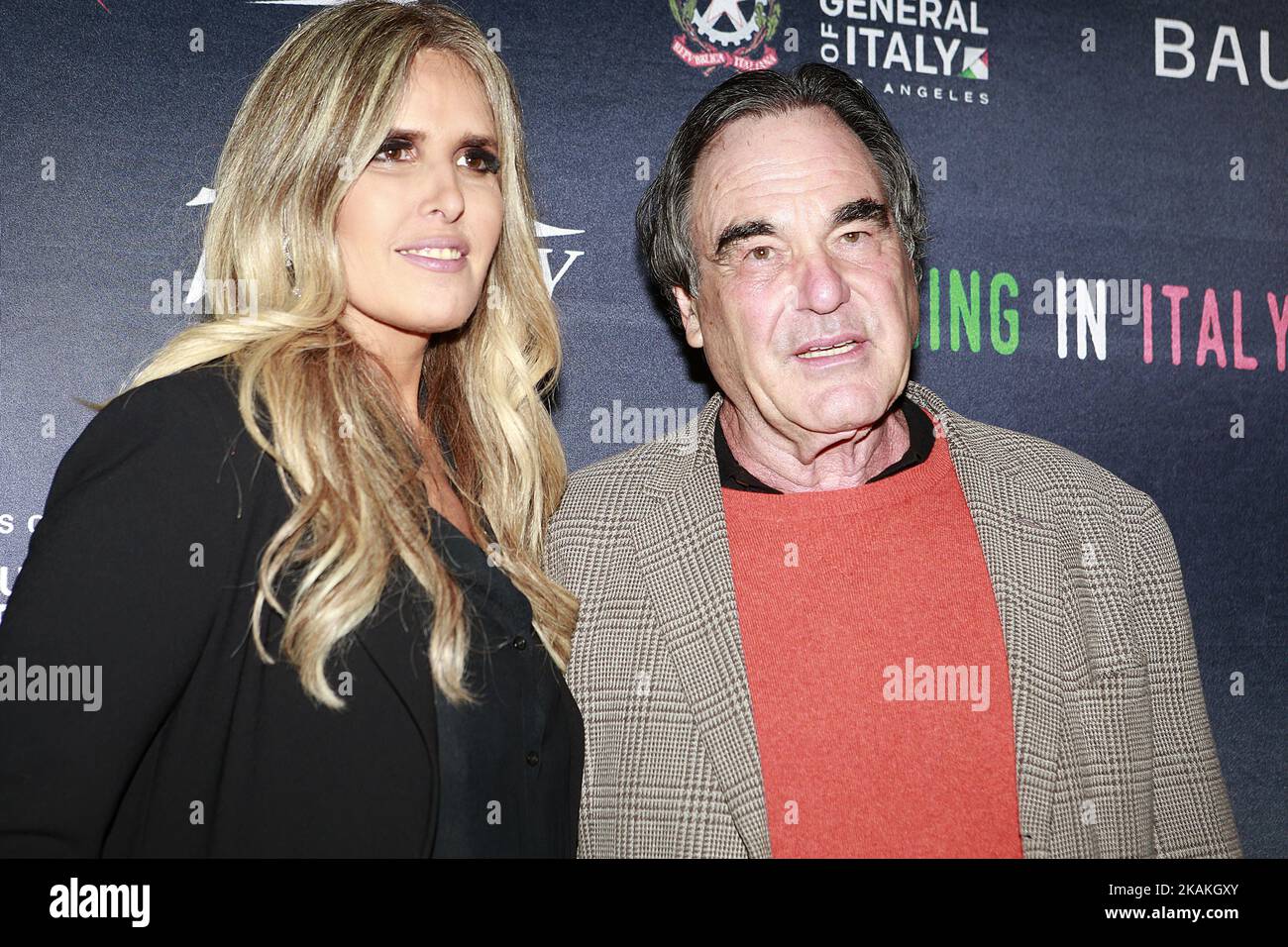Filming on Italy Executive Director Tiziana Rocca and Director Oliver Stone (R) on the red carpet prior Mr. Stone receiving the 'Baume & Mercier Special Filming on Italy Award' at Italian Cultural Institute in Los Angeles, CA on February 3, 2017 (Photo by Neca Dantas/NurPhoto) *** Please Use Credit from Credit Field *** Stock Photo