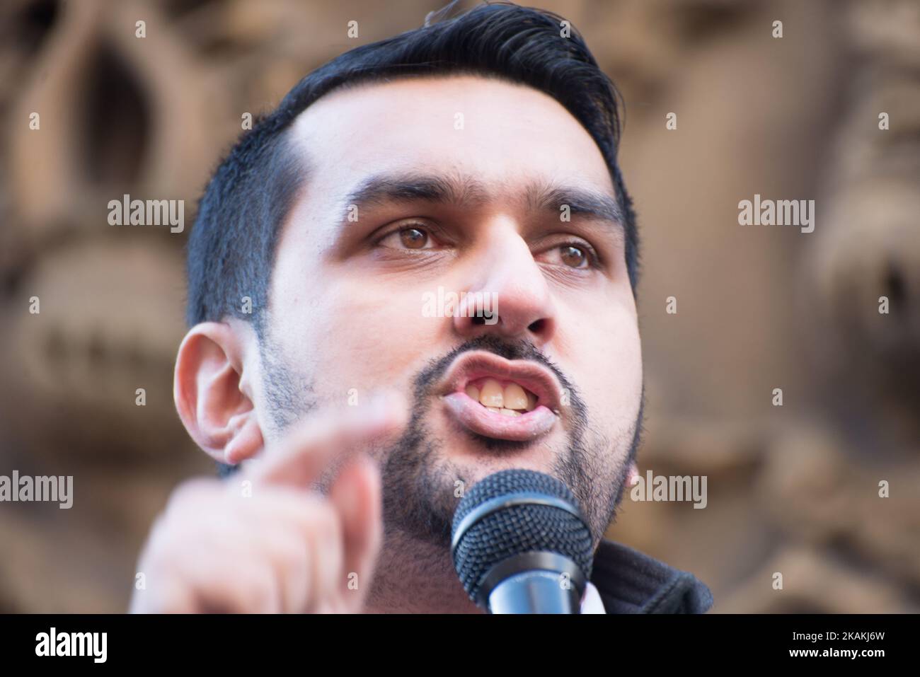 Tamoor Tariq, member of Bury Council for Redvales Ward and Greater Manchester lead for domestic abuse, speaks at an anti-Trump Â‘Muslim BanÂ’ demonstration on Saturday Feb. 4, 2017 in Manchester, United Kingdom. The demonstration, which happened in solidarity with other demonstrations in other cities, was prompted by President Trump signing an executive order halting the entire US refugee programme and banning anyone from Iran, Iraq, Libya, Somalia, Sudan, Syria and Yemen as well as people with dual nationality. (Photo by Jonathan Nicholson/NurPhoto) *** Please Use Credit from Credit Field *** Stock Photo