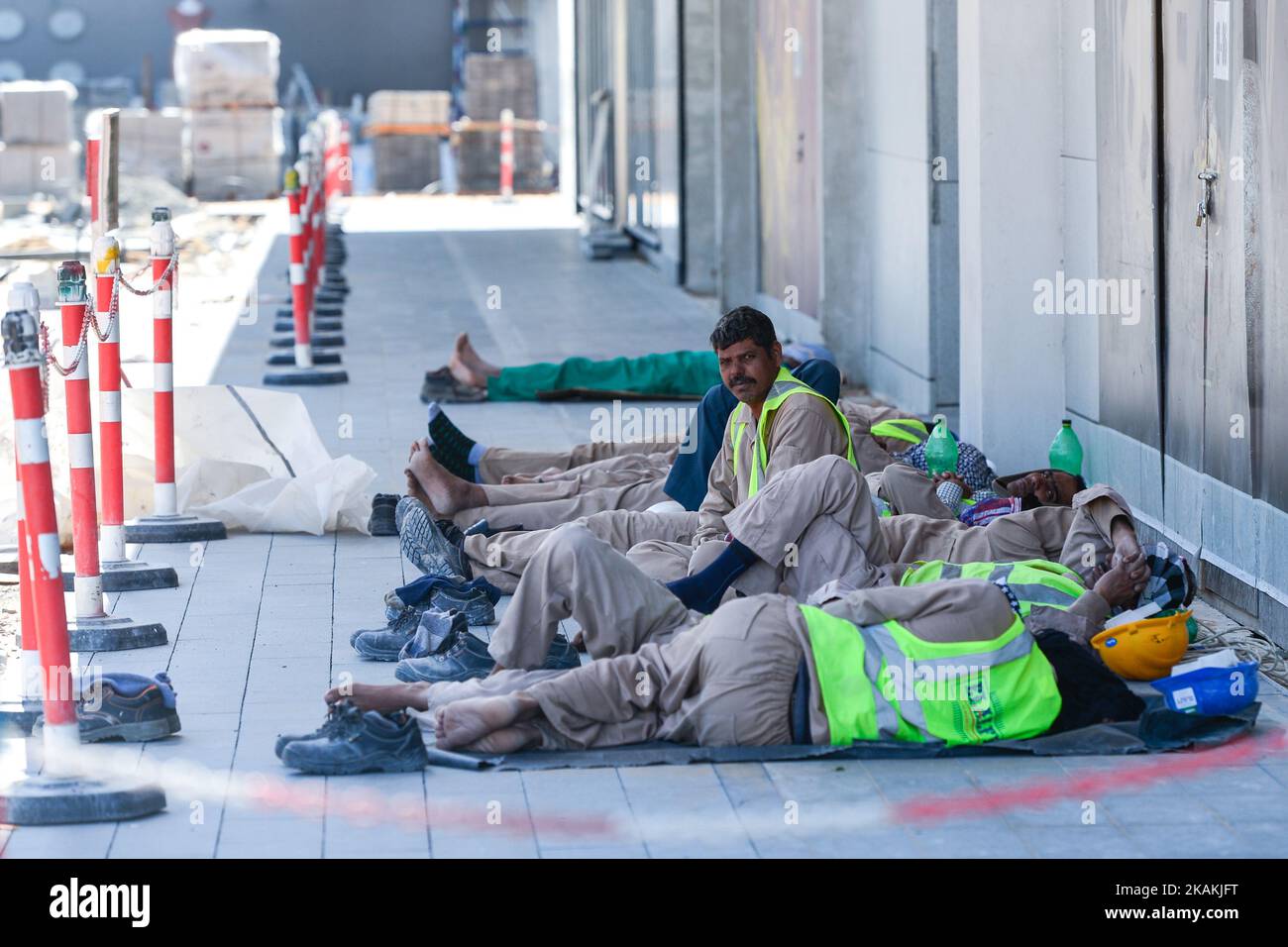 A group of construction workers taking a break in the City Walk area