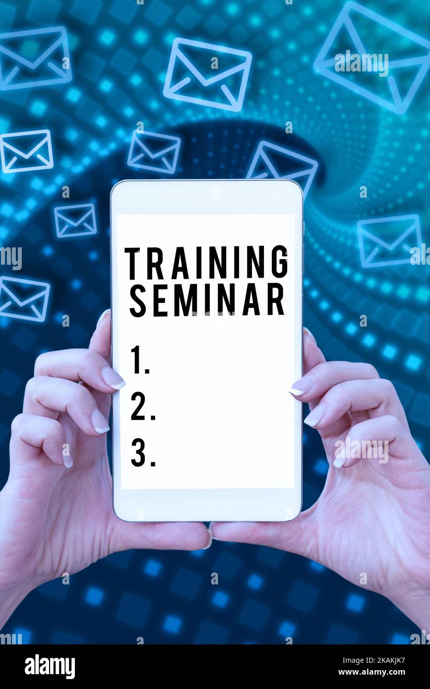 Hand writing sign Training Seminar. Concept meaning covers the costs