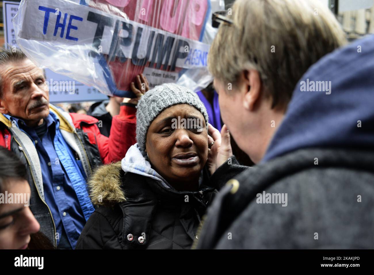Pat Kelley, of Lancaster County, PA (foreground), interacts Myra Young, of Germantown, Philadelphia, PA (center) after Young shared her life story with hundreds gathered in protest outside the Center City, Philadelphia, PA office of Senator Pat Toomey (R-PA), on February 7th, 2017. Moments earlier Sen. Toomey cast a controversial and widely protested vote in favor for Betsy DeVos to become the Secretary of Education in the Trump-Administration. (Photo by Bastiaan Slabbers/NurPhoto) *** Please Use Credit from Credit Field *** Stock Photo