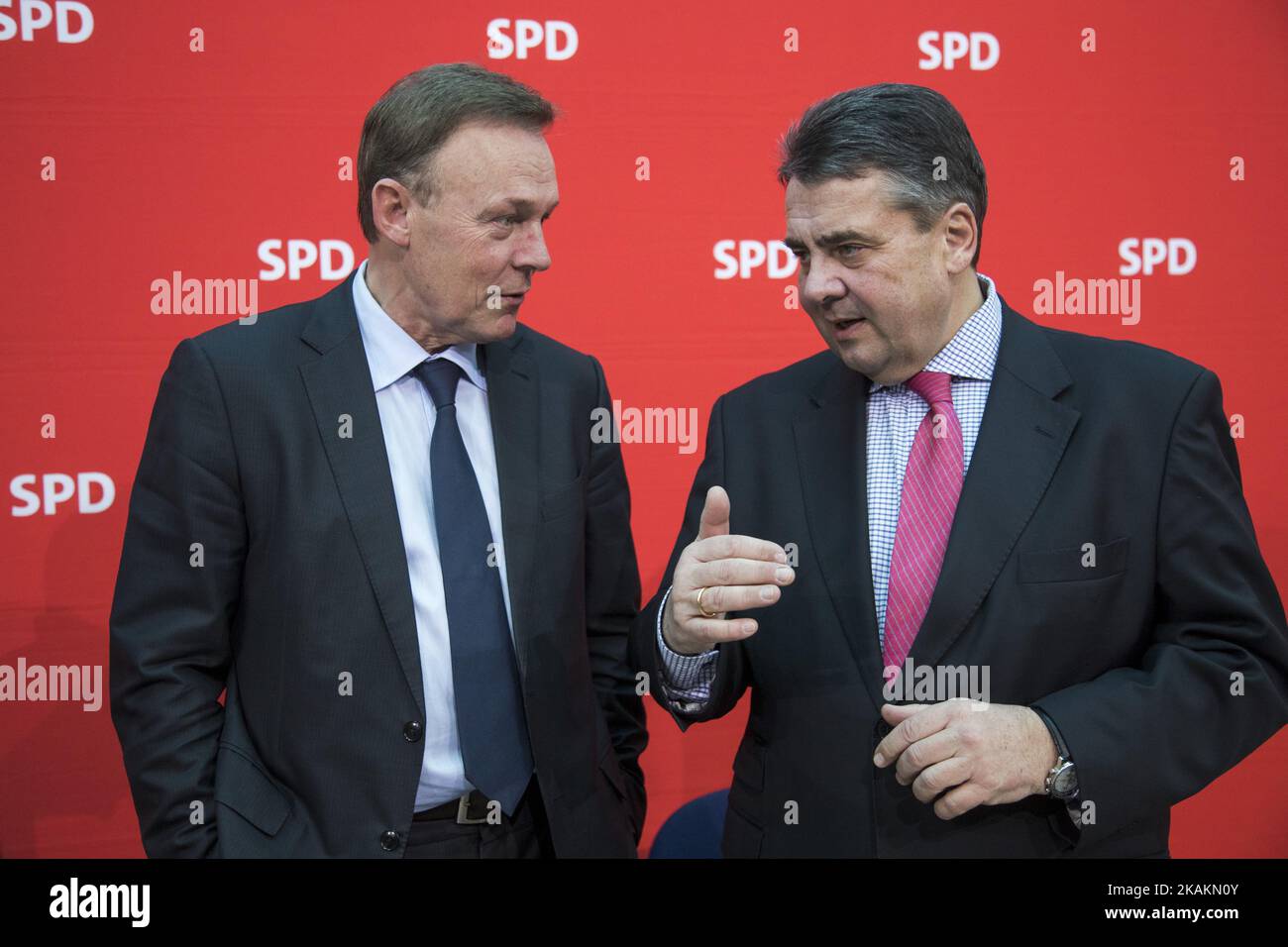 German Foreign Minister Sigmar Gabriel (R) and chairman of the Bundestag SPD faction Thomas Oppermann (L) chat prior to a Party Board meeting at the SPD headquarters in Willy-Brandt-Haus in Berlin, Germany on February 13, 2017. (Photo by Emmanuele Contini/NurPhoto) *** Please Use Credit from Credit Field *** Stock Photo