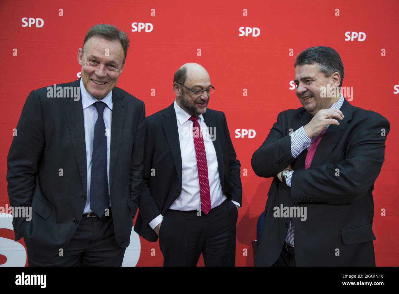 Chancellor candidate of the German Social Democratic party (SPD) Martin Schulz (C), German Foreign Minister Sigmar Gabriel (R) and chairman of the Bundestag SPD faction Thomas Oppermann (L) chat prior to a Party Board meeting at the SPD headquarters in Willy-Brandt-Haus in Berlin, Germany on February 13, 2017. (Photo by Emmanuele Contini/NurPhoto) *** Please Use Credit from Credit Field *** Stock Photo