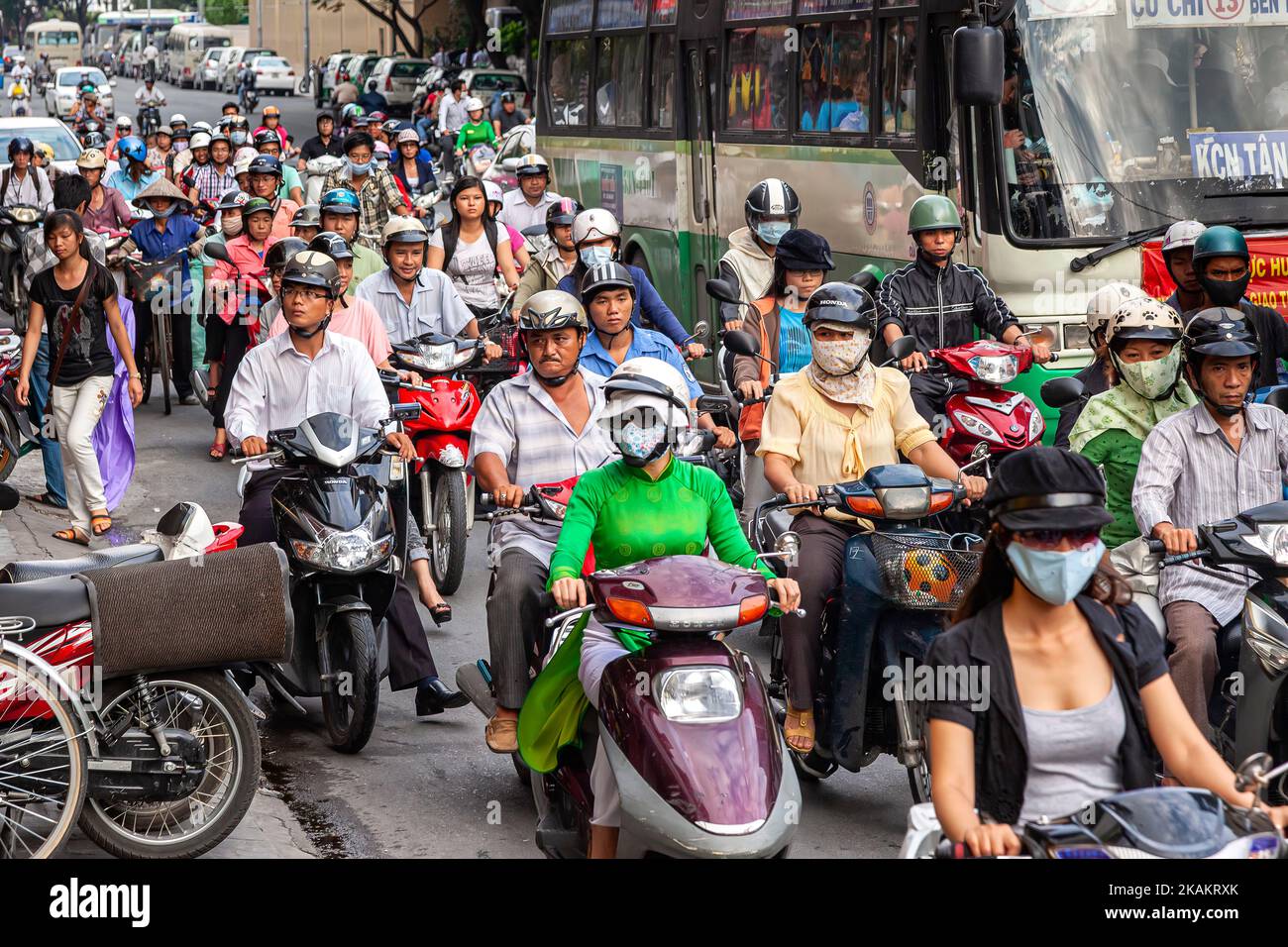 Motorcycle riders, traffic, and congestion, Ho Chi Minh City centre, Vietnam Stock Photo