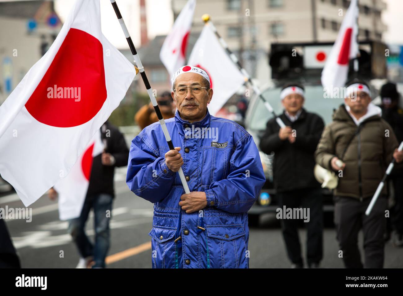 Japanese nationalists march with flags to protest South Korea to return disputed islets prior to the Takeshima Sovereignty Ceremony, a small disputed island controlled by South Korea which it calls Dokdo and Japan calls it Takeshima, in Matsue in Shimane Prefecture, western Japan on Feb. 22, 2017. Japan urged South Korea to return disputed islets, The sovereignty issue over the islands has been the subject of a long territorial dispute between South Korean and Japan. (Photo by Richard Atrero de Guzman/NurPhoto) *** Please Use Credit from Credit Field *** Stock Photo