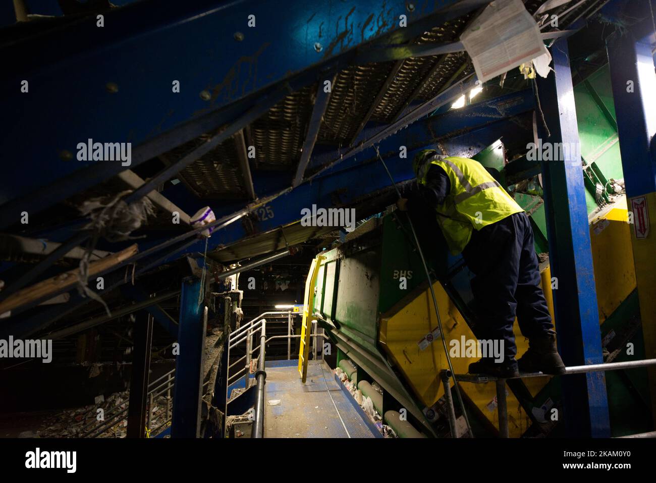 Employee monitors a section of the production as multiple layers of ...