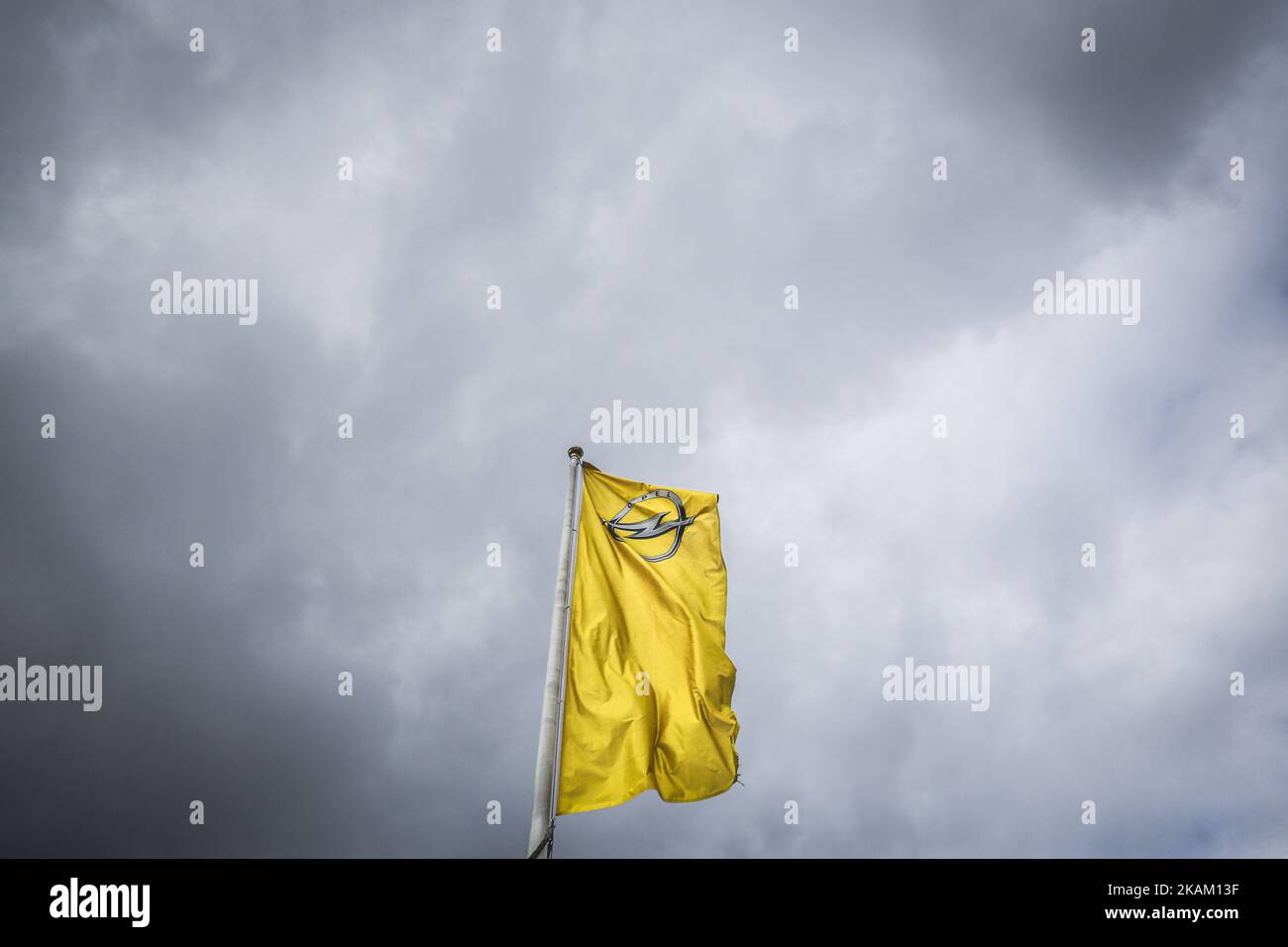 A flag with the logo of Opel company outside the Opel car factory of General Motors Manufacturing Poland in Gliwice, Poland, on March 7, 2017. General Motors is selling its loss-making European car business, including Germany's Opel and British brand Vauxhall, to France's PSA group. (Photo by Beata Zawrzel/NurPhoto) *** Please Use Credit from Credit Field *** Stock Photo