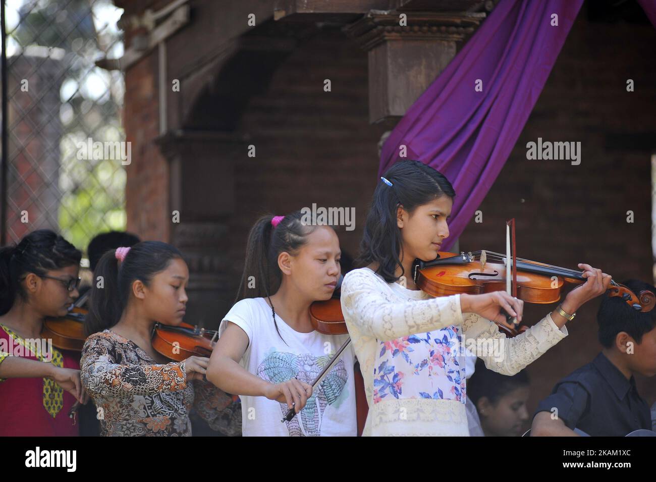 Girls from Maiti Nepal plays instrumental music during Maiti Nepal felicitated nine female conductors of Mahanagar Yatayat on 107th International Women's Day at Kathmandu, Nepal on Wednesday, March 08, 2017. (Photo by Narayan Maharjan/NurPhoto) *** Please Use Credit from Credit Field *** Stock Photo