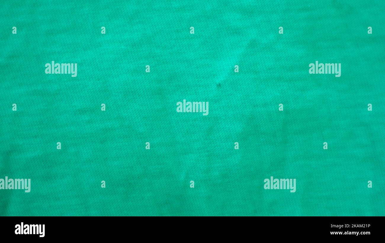 green fabric texture as background Stock Photo - Alamy