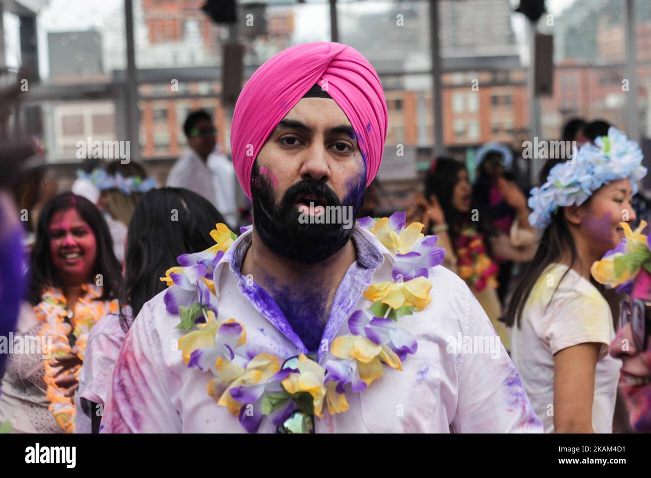 New Yorker people celebrates Holi, the festival of color at ower