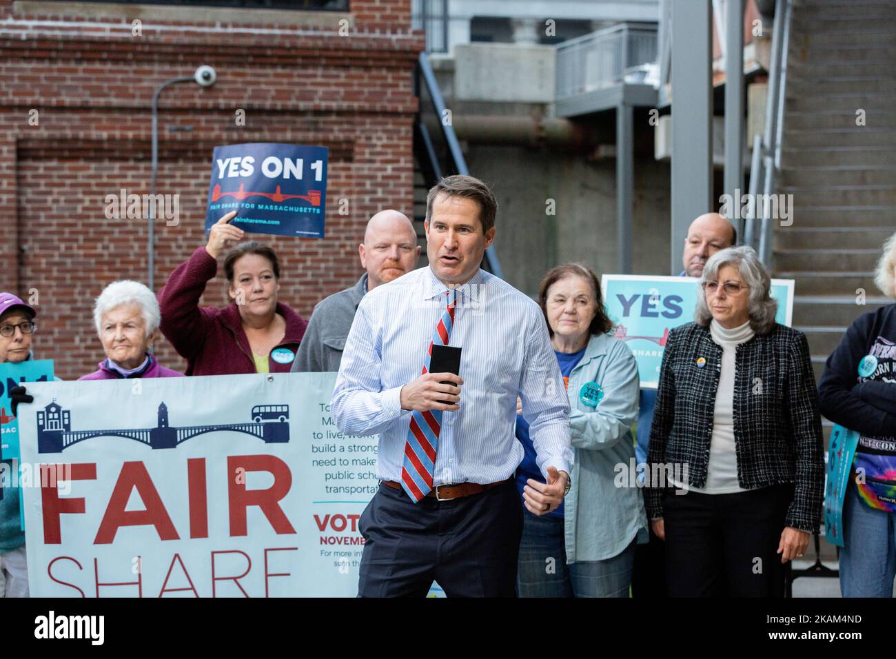 November 1, 2022. Salem, MA.  Supporters of YES on 1 the Fair Share ballot question rallied at the Salem, MA Intermodal transportation terminal to exp Stock Photo