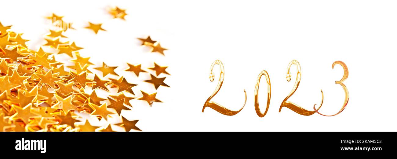 Golden numbers 2023 with christmas table star ornaments on white panoramic background, new year web banner Stock Photo