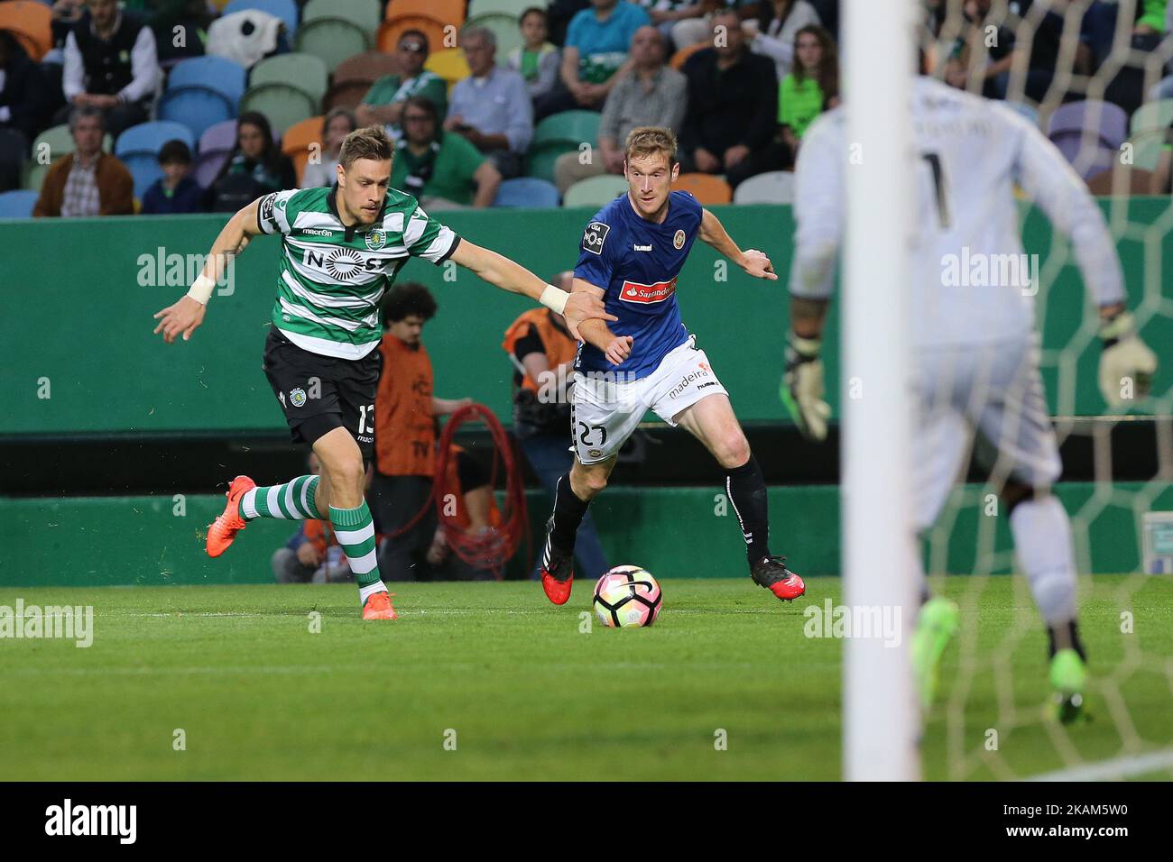 Sportings defender Sebastian Coates from Uruguay (L) and Nacionals forward Fernando Aristeguieta from Venezuela (R) during Premier League 2016 - 2017 match between Sporting CP and CD Nacional, at Alvalade Stadium in Lisbon on March 18, 2016. (Photo by Bruno Barros / DPI / NurPhoto) *** Please Use Credit from Credit Field *** Stock Photo