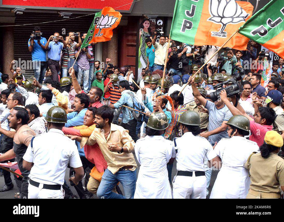 The BJP supporters from West Bengal drove a massive protest rally in Narada scam demanding arrest of the alleged Trinamool Congress Ministers and MLAs in connection with the Narada sting scam. The rally at Dharmatala was stopped by police which took turn to a confrontation. The clash took a bigger shape after the party members allegedly threw stones at the cops in the process of which a BJP supporter got injured and has been admitted in a hospital on March 22,2017 in Kolkata,India. (Photo by Debajyoti Chakraborty/NurPhoto) *** Please Use Credit from Credit Field *** Stock Photo