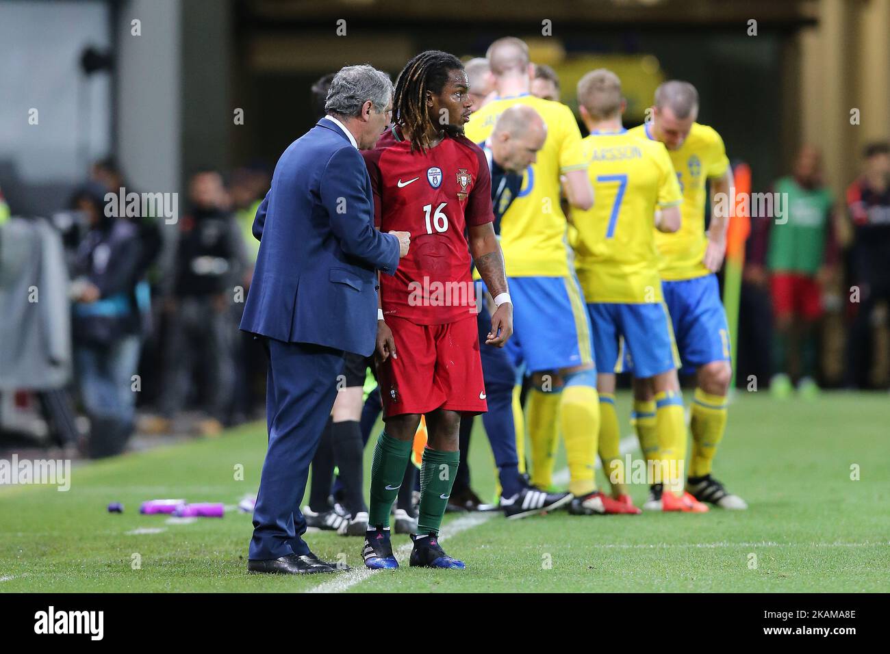 Portugals midfielder Renato Sanches (R) speaking with Portugals head coach Fernando Santos (L) during the FIFA 2018 World Cup friendly match between Portugal v Sweden at Estadio dos Barreiros on March 28, 2017 in Funchal, Madeira, Portugal. (Photo by Bruno Barros / DPI / NurPhoto ) *** Please Use Credit from Credit Field *** Stock Photo