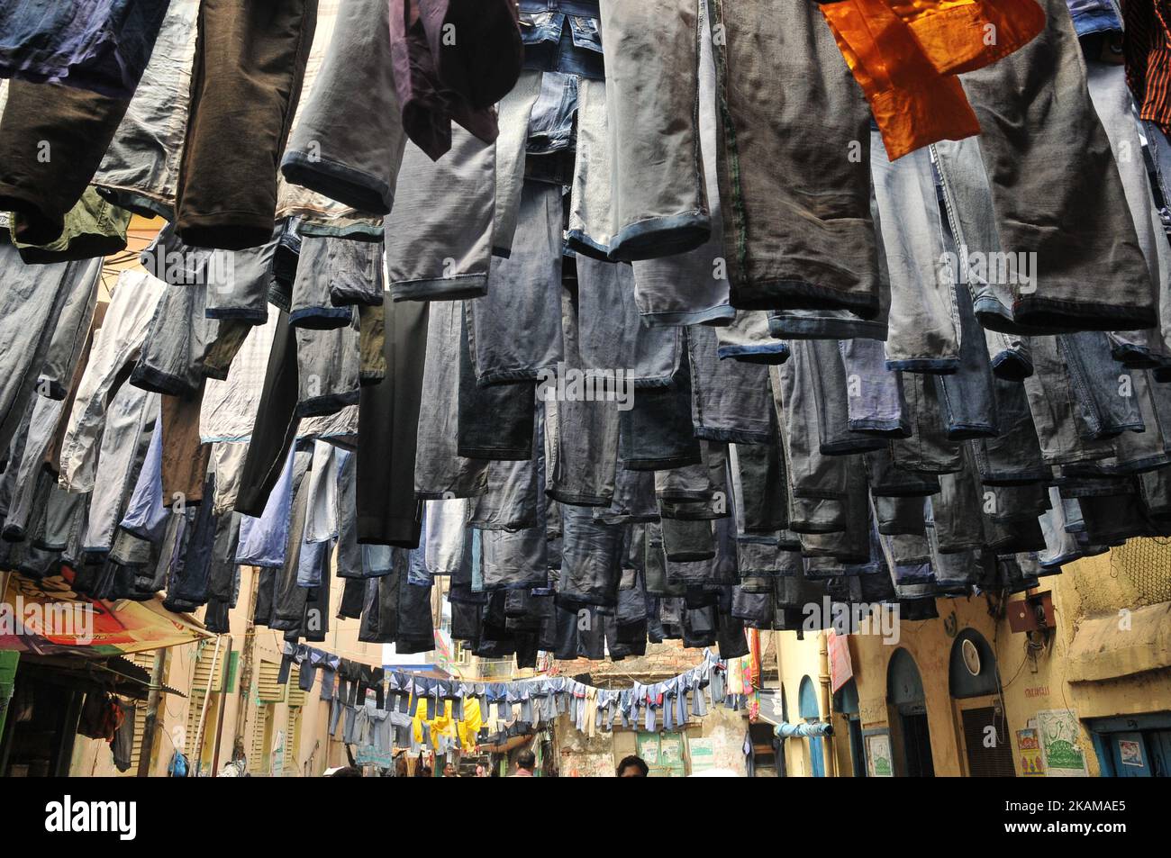 Used pairs of jeans are hung to dry in Kolkata,India on March 29, 2017.  (Photo by Debajyoti Chakraborty/NurPhoto) *** Please Use Credit from Credit  Field *** Stock Photo - Alamy