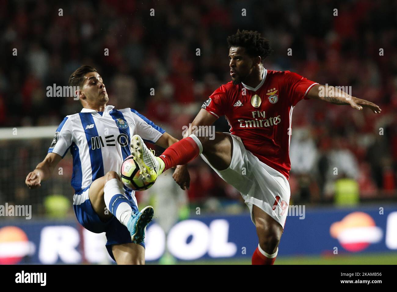 Porto's forward Andre Silva (L) vies for the ball with Benfica's defender Eliseu (R) during Premier League 2016/17 match between SL Benfica vs FC Porto, in Lisbon, on April 1, 2017. (Photo by Carlos Palma/NurPhoto) *** Please Use Credit from Credit Field *** Stock Photo