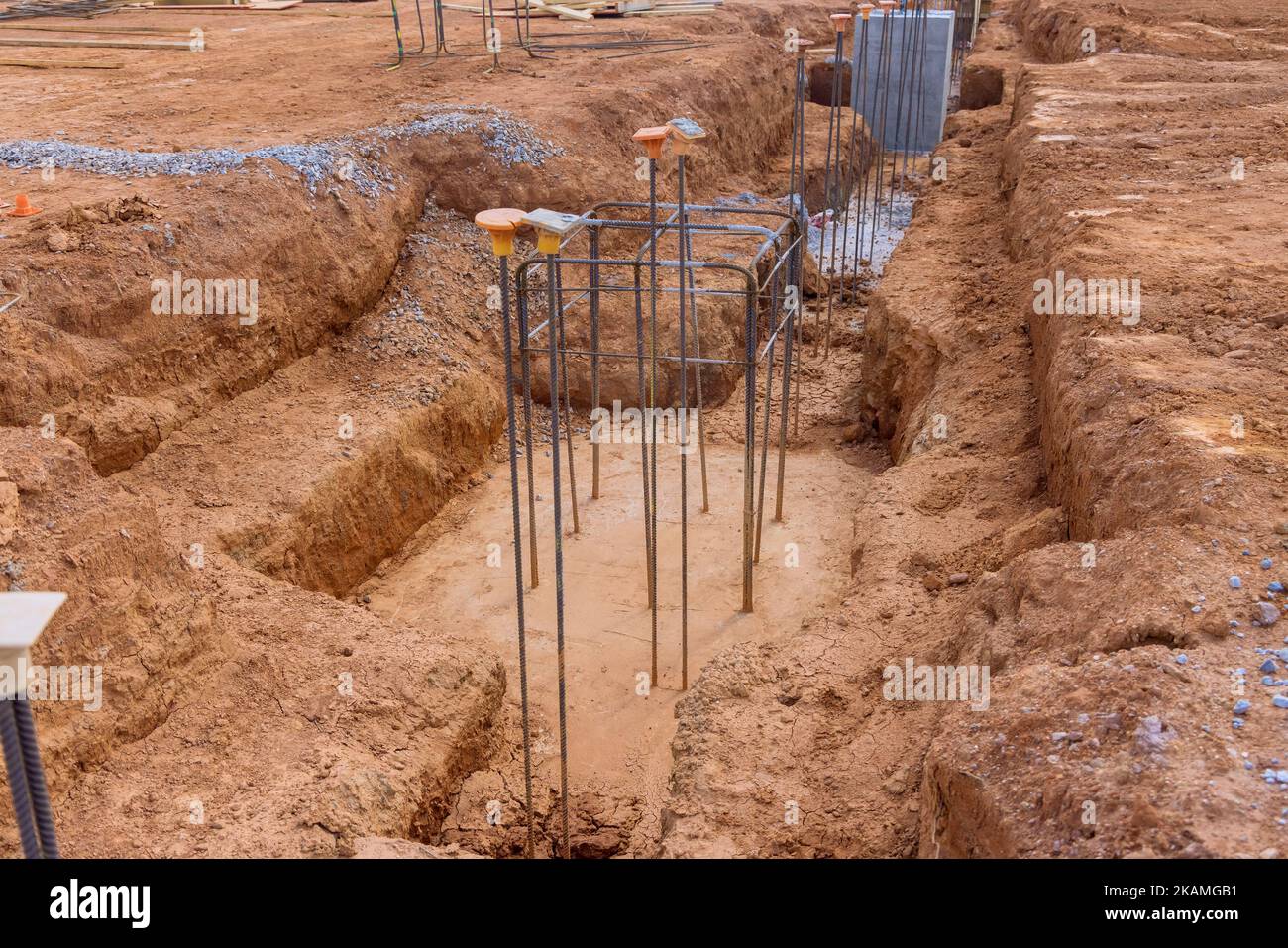 Reinforcement with steel bars rebar wires is put into trench for