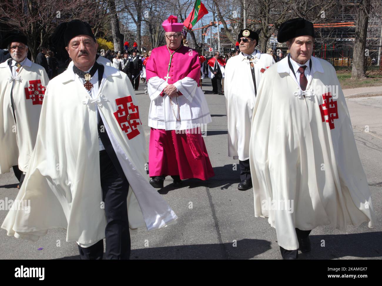 Thomas Christopher Collins, the Canadian cardinal of the Catholic Church and the Archbishop of Toronto takes part in the Good Friday procession in Little Italy in Toronto, Ontario, Canada, on April 14, 2017. The Saint Francis of Assisi Church and Little Italy community celebrated Good Friday with the traditional procession representing the events that led to the Crucifixion and Resurrection of Jesus Christ. (Photo by Creative Touch Imaging Ltd./NurPhoto) *** Please Use Credit from Credit Field *** Stock Photo