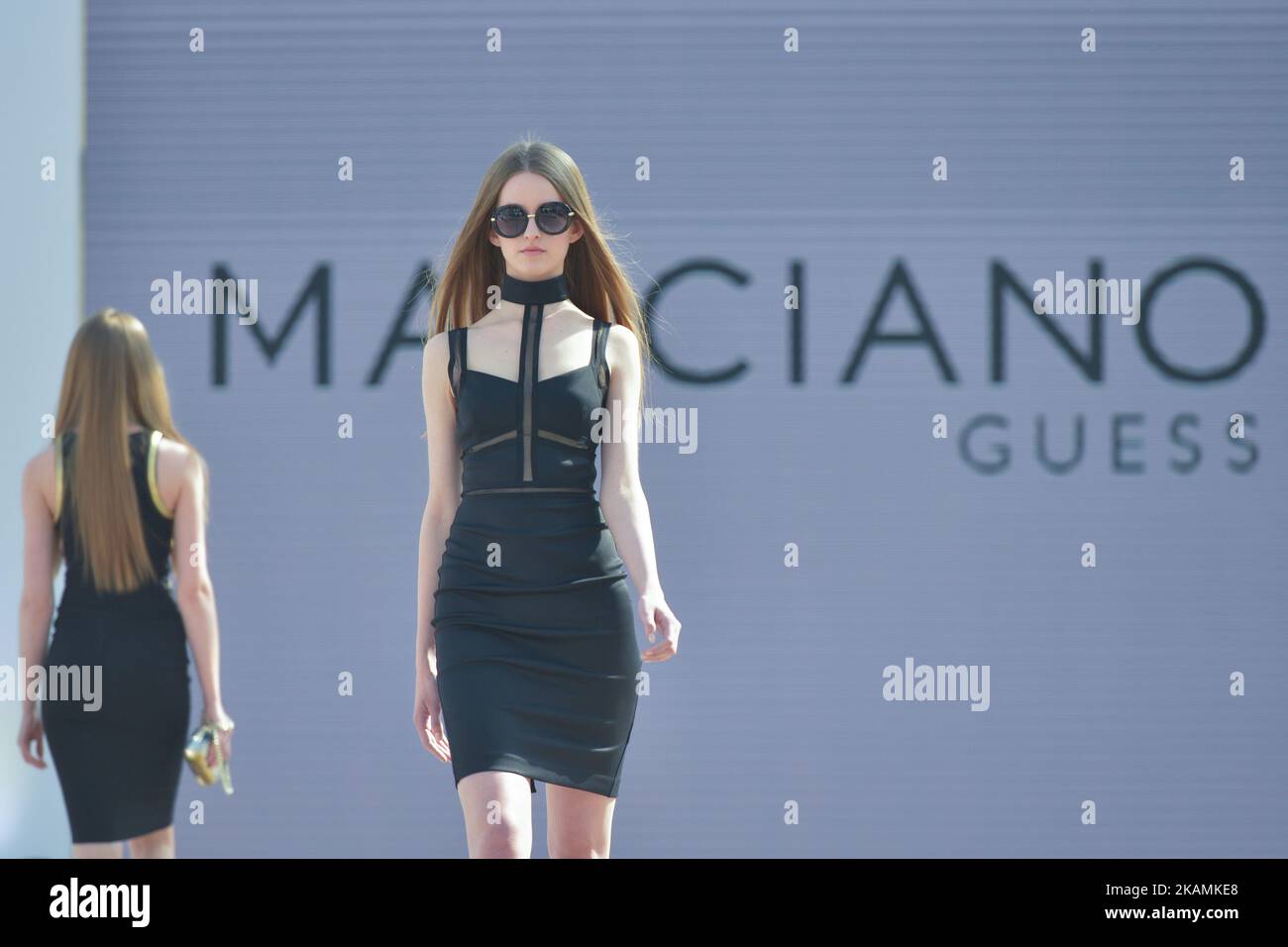 A model showcases a creation by Marciano Guess during the Fashion