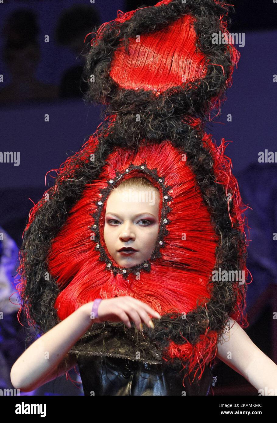 Models present hair style creations during the annual international  hairdressers festival of Hairdressing, Fashion and Design "Crystal Angel"  in Kiev, Ukraine, 22 April 2017. Hairdressers and make-up artists from  Italy,Turkey ,France, Greece,