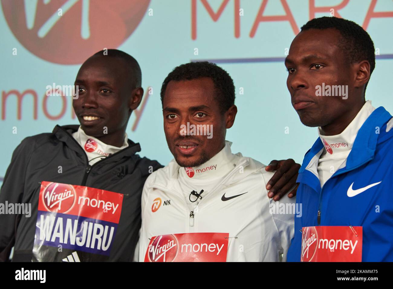 Second placed Ethiopia's Kenenisa Bekele (C), winner Kenya's Daniel Wanjiru (L) and third placed Kenya's Bedan Karoki (R) pose on the podium during a press conference after the Men's elite race at the London marathon on April 23, 2017 in London. (Photo by Karyn Louise/NurPhoto) *** Please Use Credit from Credit Field *** Stock Photo