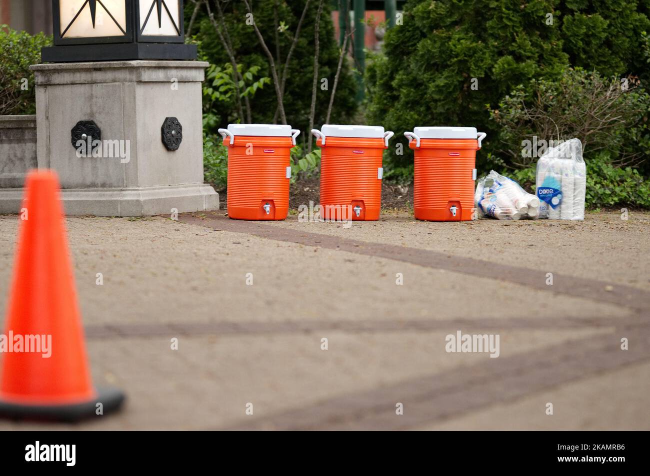 Water containers and cups form a drinking station as preparations are made for a leisure run in Harrisburg, PA, on April 30, 2017. Diminishing retail, crumbling infrastructure, environmental issues, poverty and unemployment are shown in a view on the current state of a section of rural America on day 101 of Trump's Presidency. The Keystone state Pennsylvania formed an important factor in Trump's victory in the 2016 US elections. (Photo by Bastiaan Slabbers/NurPhoto) *** Please Use Credit from Credit Field *** Stock Photo