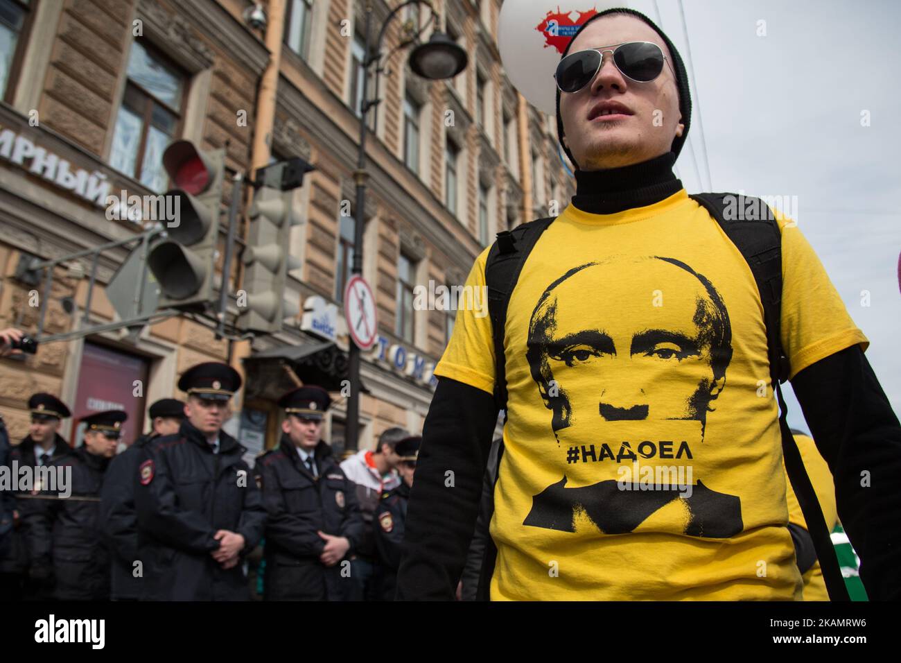 A participant of the opposition party 'Open Russia' in a T-shirt with an inscription 'Nadoel' (Bored) against Russian President Vladimir Putin during the May Day demonstration on Nevsky prospect in St.Petersburg, Russia, Monday, May 1, 2017. (Photo by Igor Russak/NurPhoto) *** Please Use Credit from Credit Field *** Stock Photo
