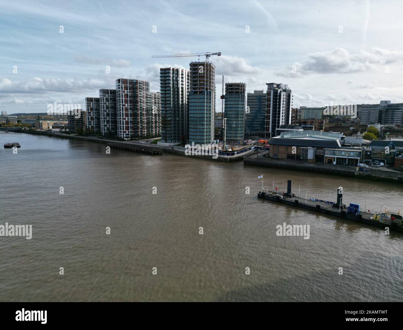 Woolwich waterfront apartments on River Thames London UK drone aerial view Stock Photo