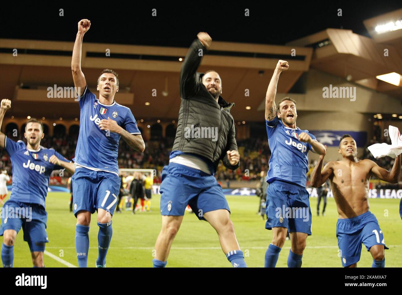 Juventus' forward from Argentina Gonzalo Higuain (black jacket) who scored 2 goals celebrates with team mates their 2-0 win over Monaco during the UEFA Champions League semi-final first leg football match Monaco vs Juventus at the Stade Louis II stadium in Monaco on May 3, 2017. (Photo by Loris Roselli/NurPhoto) *** Please Use Credit from Credit Field *** Stock Photo
